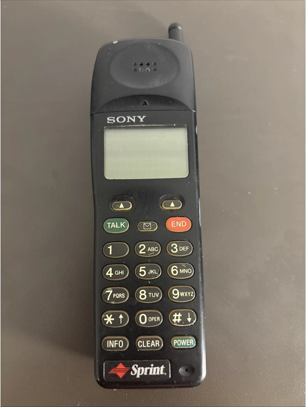 Vintage Sony CM-D600S Flip Up Top Candy Bar Cell Phone Sprint - Untested
